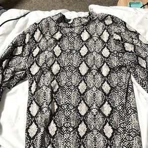snake print, size medium, long sleeve, good condition